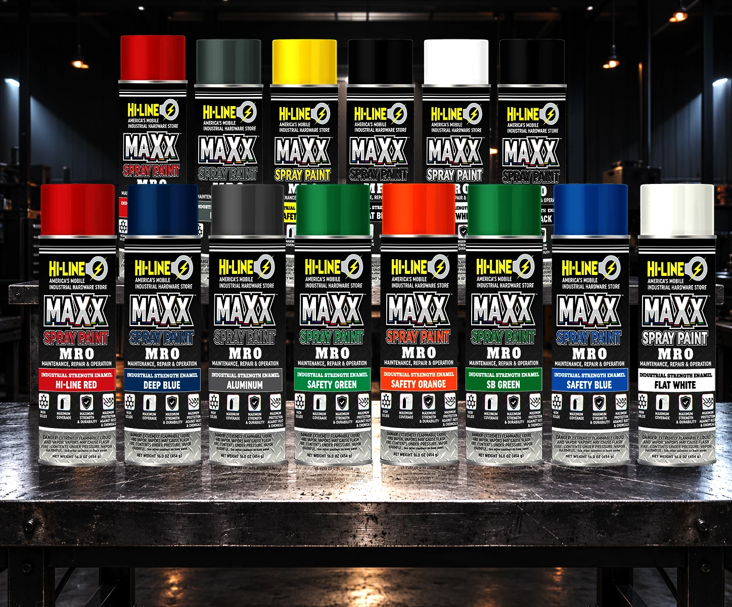 The MAXX spray paint line arranged across a workbench in an industrial bay